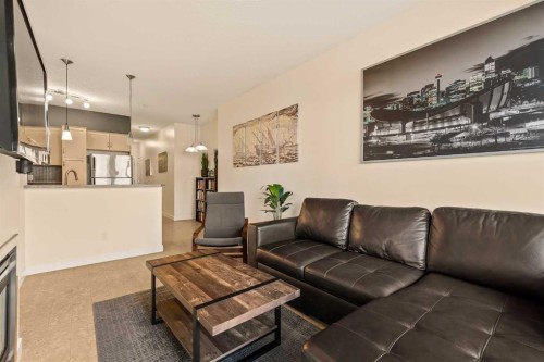 311-208 Holy Cross Lane Sw, Calgary, AB - Indoor Photo Showing Living Room