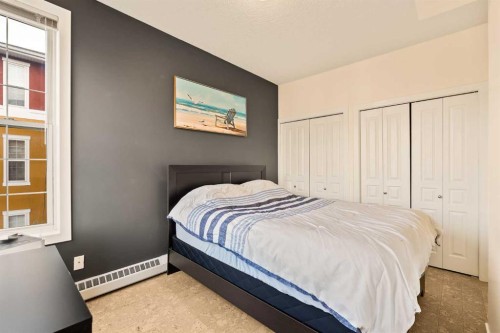 311-208 Holy Cross Lane Sw, Calgary, AB - Indoor Photo Showing Bedroom