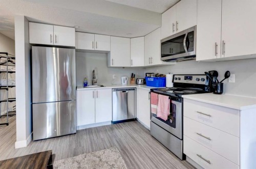 167 Springborough Way Sw, Calgary, AB - Indoor Photo Showing Kitchen With Stainless Steel Kitchen