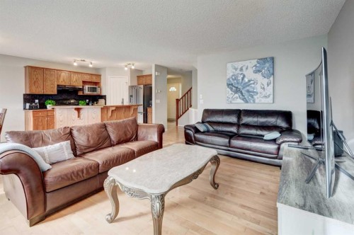 167 Springborough Way Sw, Calgary, AB - Indoor Photo Showing Living Room