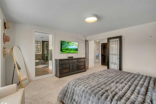 42 Douglas Woods Way Se, Calgary, AB - Indoor Photo Showing Bedroom