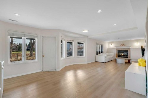 42 Douglas Woods Way Se, Calgary, AB - Indoor Photo Showing Living Room With Fireplace