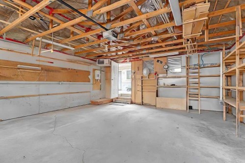 6407 Lombardy Crescent Sw, Calgary, AB - Indoor Photo Showing Garage