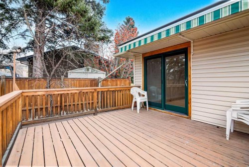 6407 Lombardy Crescent Sw, Calgary, AB - Outdoor With Deck Patio Veranda With Exterior