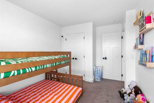 950 Mahogany Boulevard Se, Calgary, AB - Indoor Photo Showing Bedroom