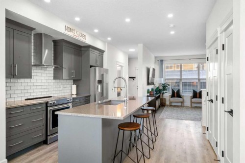 950 Mahogany Boulevard Se, Calgary, AB - Indoor Photo Showing Kitchen With Upgraded Kitchen