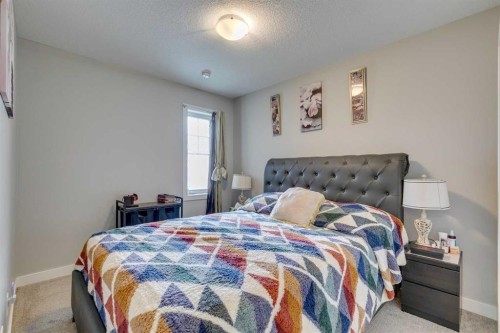 228 Sage Bluff Drive Nw, Calgary, AB - Indoor Photo Showing Bedroom