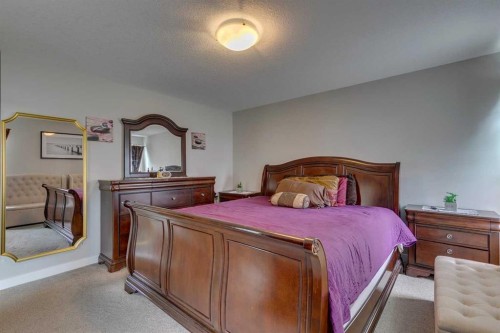 228 Sage Bluff Drive Nw, Calgary, AB - Indoor Photo Showing Bedroom
