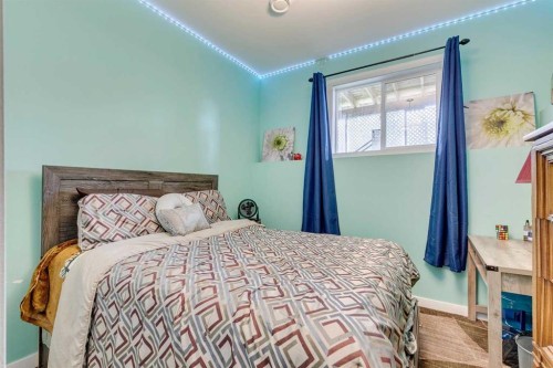 228 Sage Bluff Drive Nw, Calgary, AB - Indoor Photo Showing Bedroom