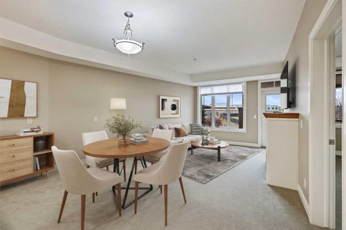 1243-2330 Fish Creek Boulevard Sw, Calgary, AB - Indoor Photo Showing Dining Room