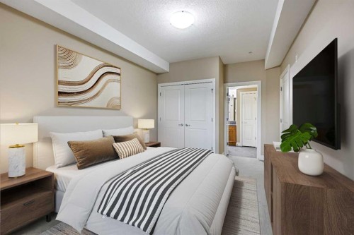 1243-2330 Fish Creek Boulevard Sw, Calgary, AB - Indoor Photo Showing Bedroom