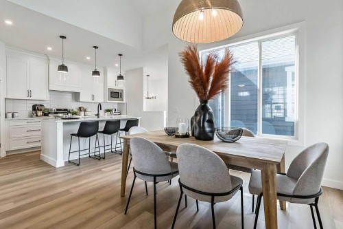 48 Drake Landing Square, Okotoks, AB - Indoor Photo Showing Dining Room