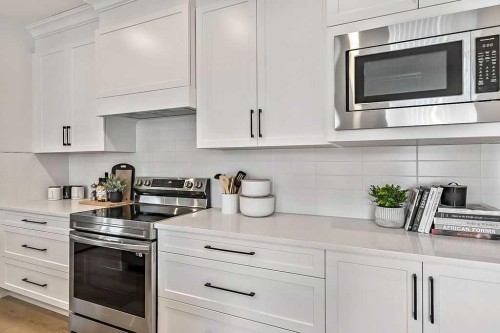 48 Drake Landing Square, Okotoks, AB - Indoor Photo Showing Kitchen