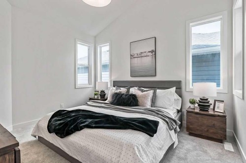 48 Drake Landing Square, Okotoks, AB - Indoor Photo Showing Bedroom