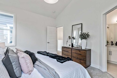 48 Drake Landing Square, Okotoks, AB - Indoor Photo Showing Bedroom