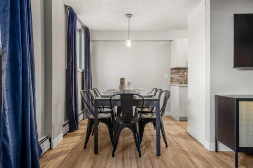 101-313 20 Avenue Sw, Calgary, AB - Indoor Photo Showing Dining Room