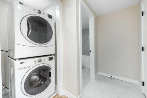 1736 41 Street Ne, Calgary, AB - Indoor Photo Showing Laundry Room