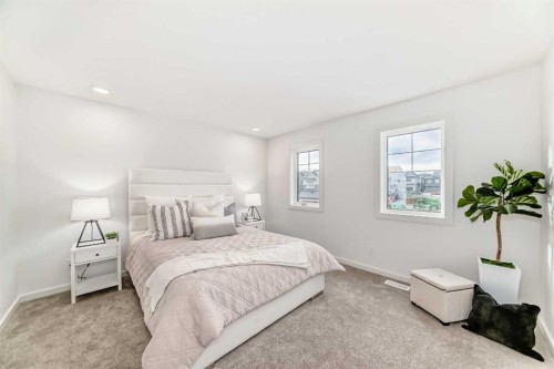12 Starling Place Nw, Calgary, AB - Indoor Photo Showing Bedroom