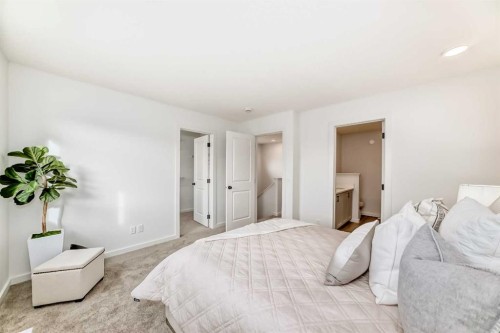 12 Starling Place Nw, Calgary, AB - Indoor Photo Showing Bedroom