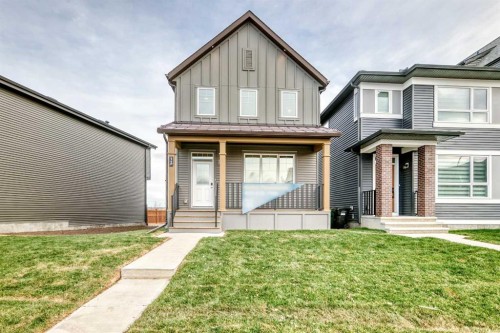 12 Starling Place Nw, Calgary, AB - Outdoor With Facade