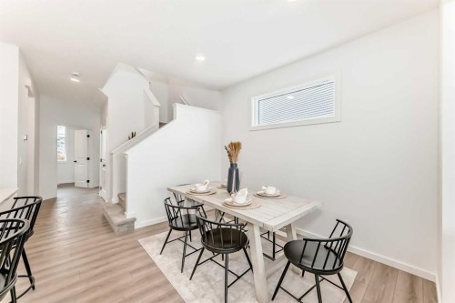 12 Starling Place Nw, Calgary, AB - Indoor Photo Showing Dining Room