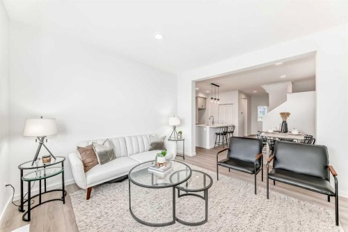 12 Starling Place Nw, Calgary, AB - Indoor Photo Showing Living Room