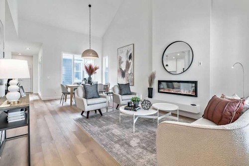 50 Drake Landing Square, Okotoks, AB - Indoor Photo Showing Living Room With Fireplace