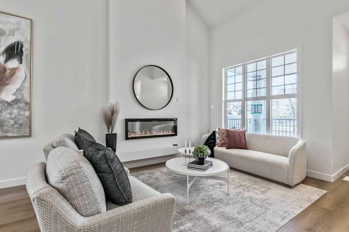 50 Drake Landing Square, Okotoks, AB - Indoor Photo Showing Living Room With Fireplace