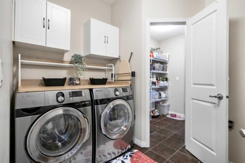 159 Panatella View Nw, Calgary, AB - Indoor Photo Showing Laundry Room