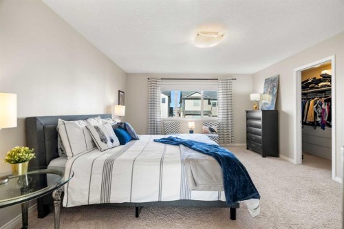 159 Panatella View Nw, Calgary, AB - Indoor Photo Showing Bedroom