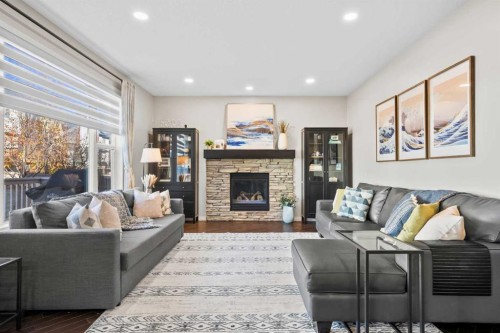 159 Panatella View Nw, Calgary, AB - Indoor Photo Showing Living Room With Fireplace