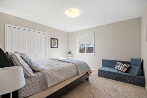 159 Panatella View Nw, Calgary, AB - Indoor Photo Showing Bedroom