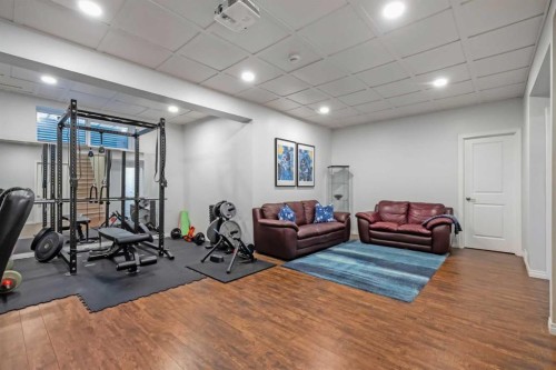 159 Panatella View Nw, Calgary, AB - Indoor Photo Showing Gym Room