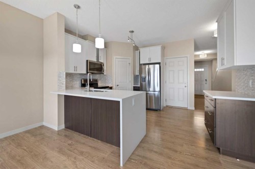 81 Copperpond Landing Se, Calgary, AB - Indoor Photo Showing Kitchen With Upgraded Kitchen