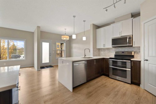81 Copperpond Landing Se, Calgary, AB - Indoor Photo Showing Kitchen With Upgraded Kitchen