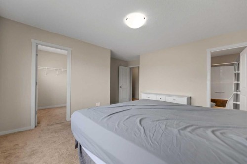 81 Copperpond Landing Se, Calgary, AB - Indoor Photo Showing Bedroom