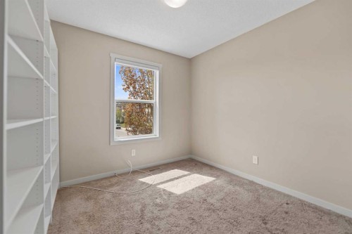 81 Copperpond Landing Se, Calgary, AB - Indoor Photo Showing Other Room