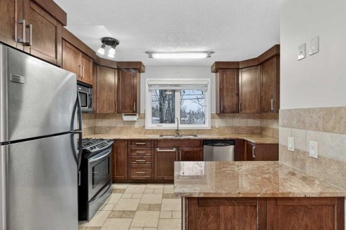5020 Nemiskam Road Nw, Calgary, AB - Indoor Photo Showing Kitchen