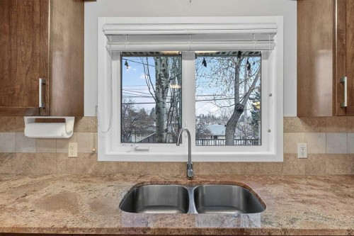 5020 Nemiskam Road Nw, Calgary, AB - Indoor Photo Showing Kitchen With Double Sink
