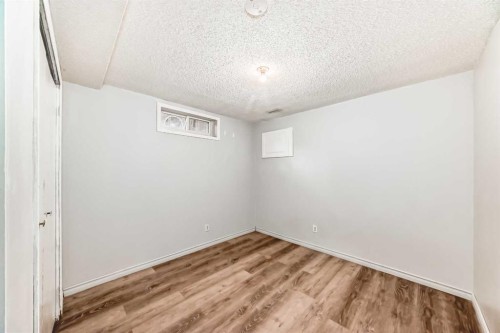 146 Dovertree Place Se, Calgary, AB - Indoor Photo Showing Other Room