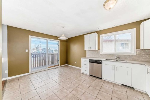 146 Dovertree Place Se, Calgary, AB - Indoor Photo Showing Kitchen