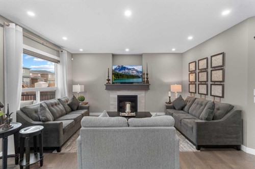 134 Cornerstone Circle Ne, Calgary, AB - Indoor Photo Showing Living Room With Fireplace