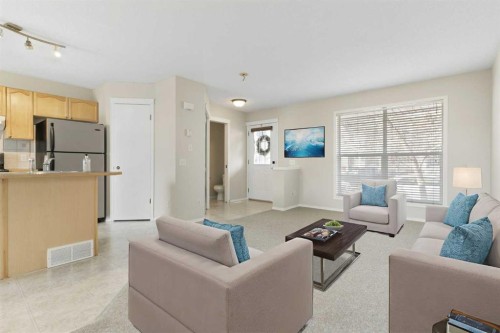50 Tuscany Springs Place Nw, Calgary, AB - Indoor Photo Showing Living Room