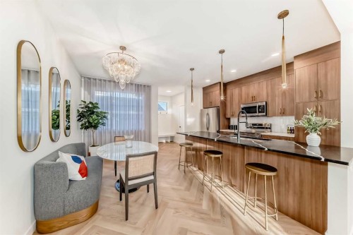 409 Clydesdale Avenue, Cochrane, AB - Indoor Photo Showing Kitchen With Upgraded Kitchen