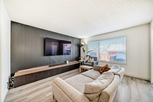 14 Autumn Crescent Se, Calgary, AB - Indoor Photo Showing Living Room