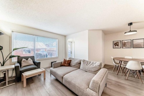 14 Autumn Crescent Se, Calgary, AB - Indoor Photo Showing Living Room