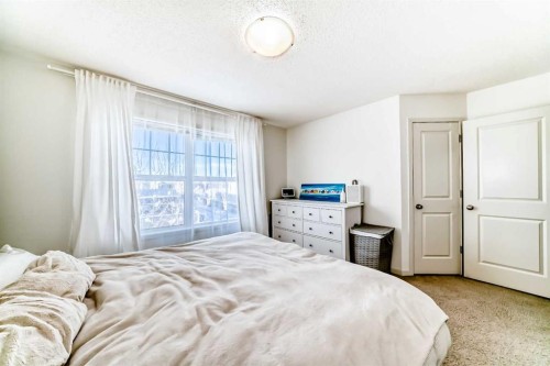14 Autumn Crescent Se, Calgary, AB - Indoor Photo Showing Bedroom