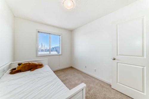 14 Autumn Crescent Se, Calgary, AB - Indoor Photo Showing Bedroom
