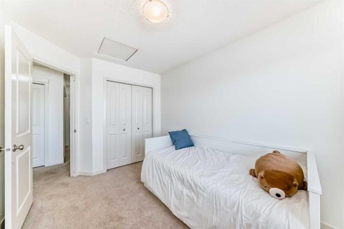 14 Autumn Crescent Se, Calgary, AB - Indoor Photo Showing Bedroom
