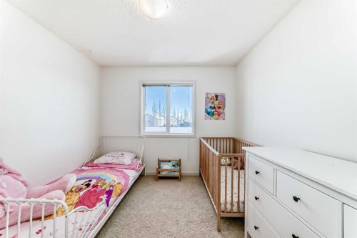 14 Autumn Crescent Se, Calgary, AB - Indoor Photo Showing Bedroom